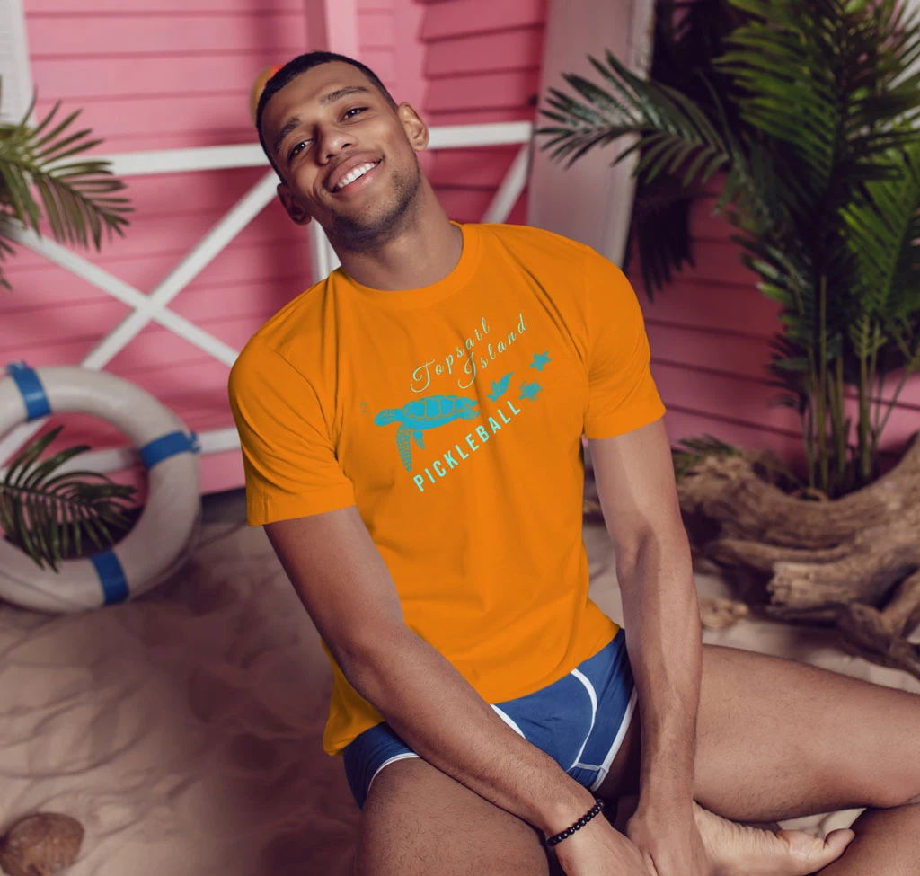 Man Wearing Bubbles Turtle in Beach Scene